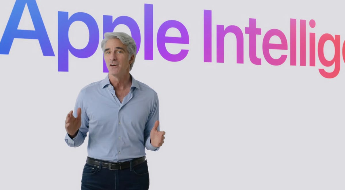 A man in front of a screen that reads Apple Intelligence